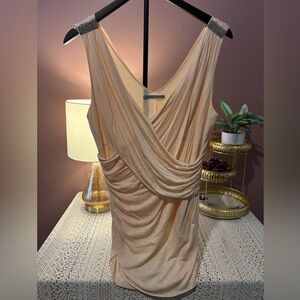 Beautifully draped, pale pink top with diamond accents on the shoulders. sz L